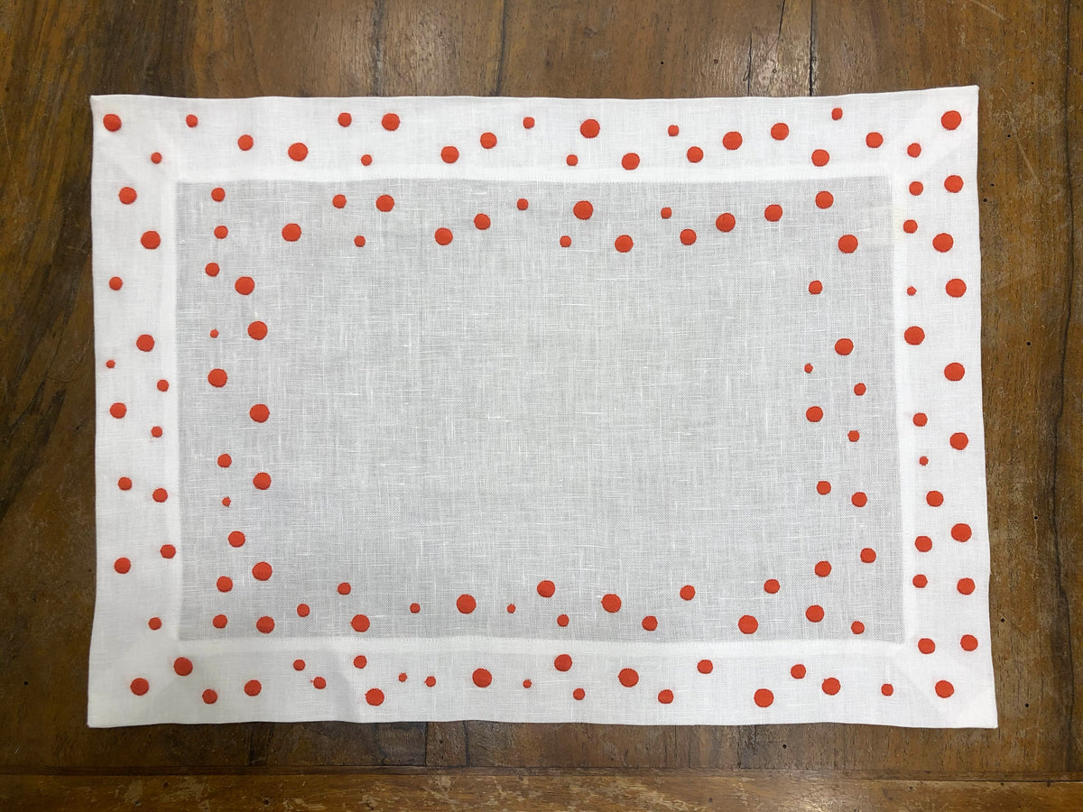 Set of 2 coral polka dot placemats and 2 napkins