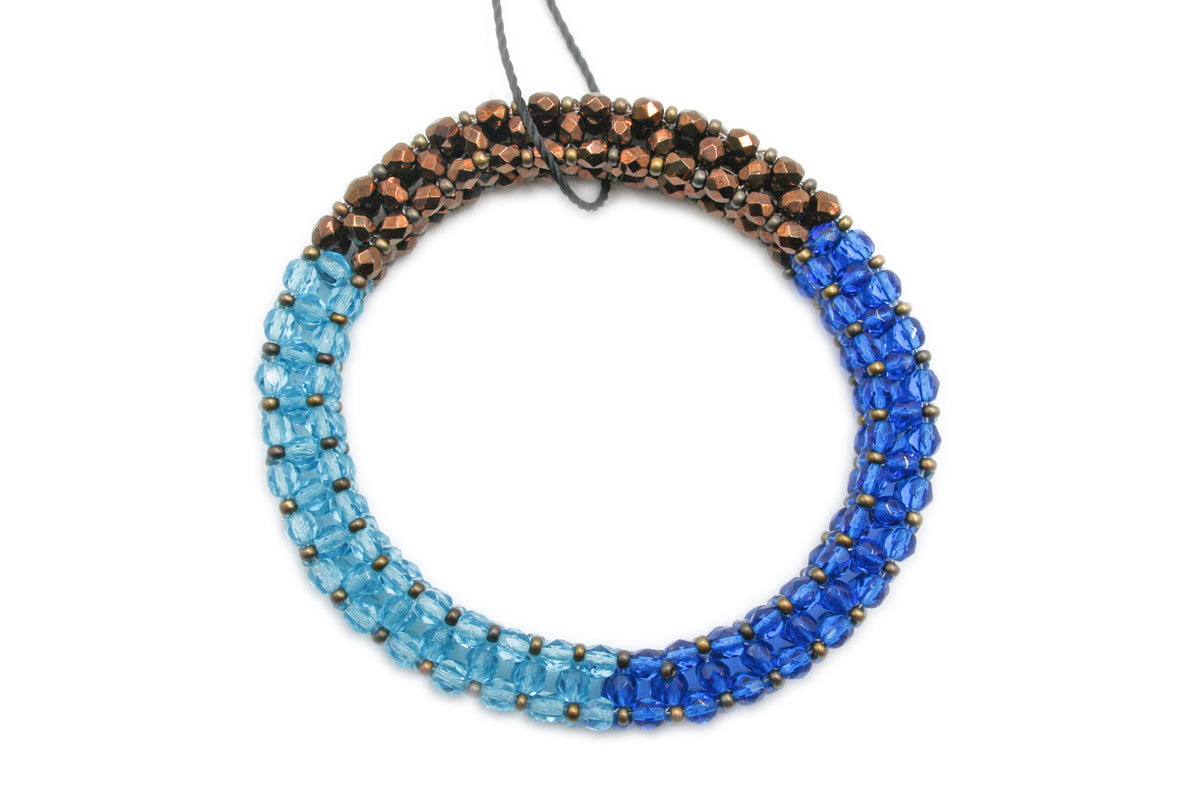 Three-color bracelet - blue, light blue, and brown
