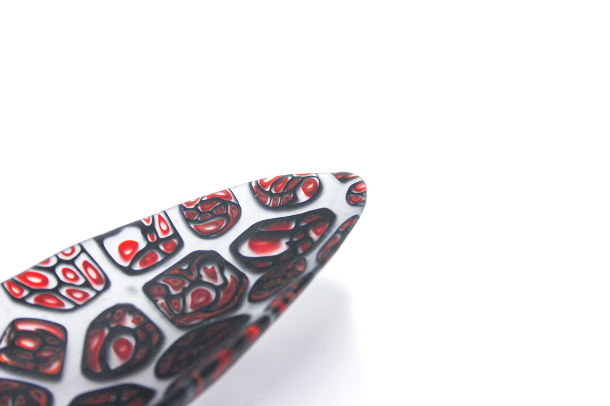 Oval black and red murrine bowl